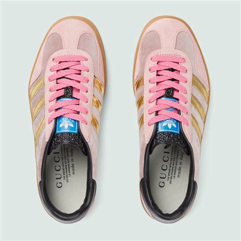 gucci adidas pink sneakers.